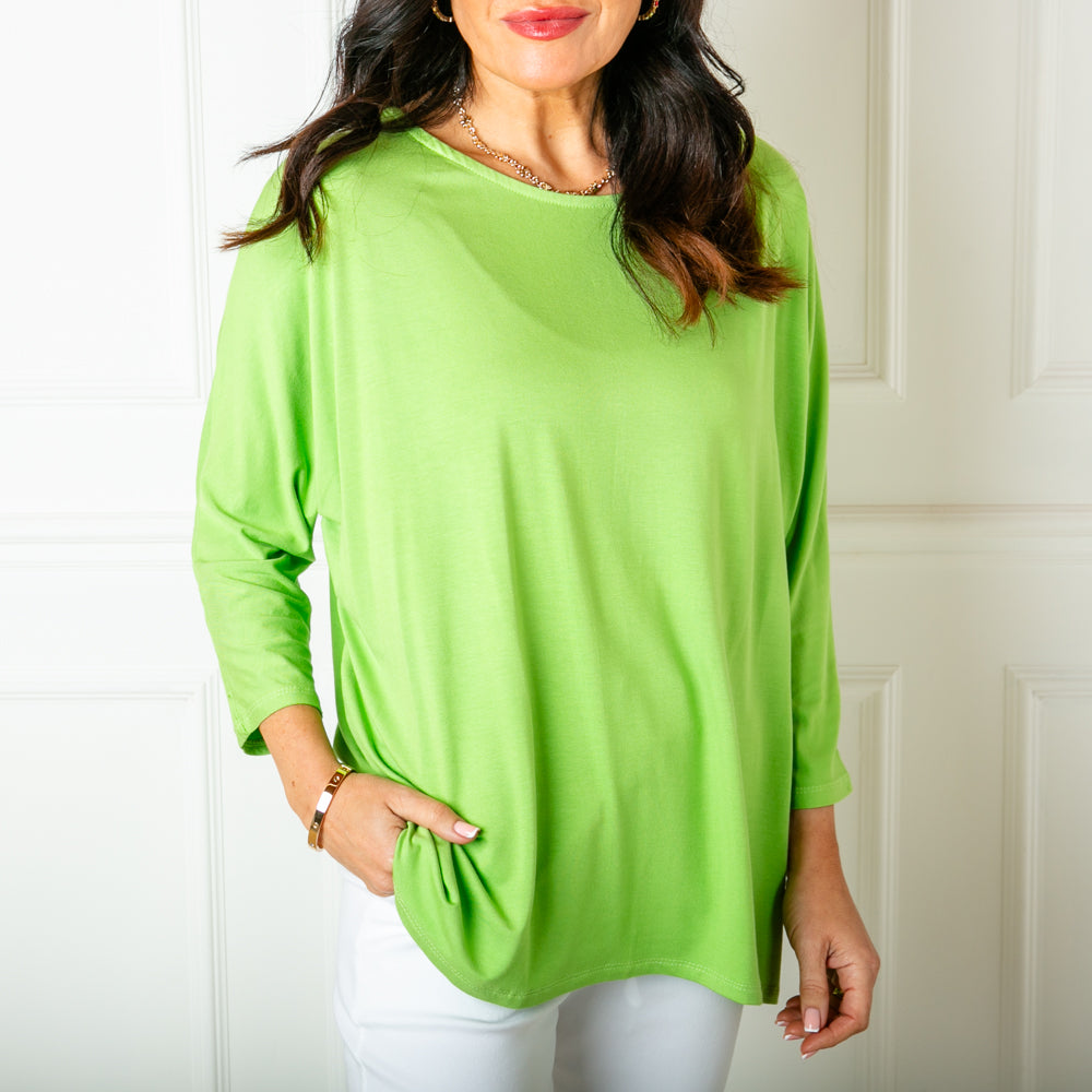 The lime green Batwing T-shirt with 3/4 length sleeves and a round neckline