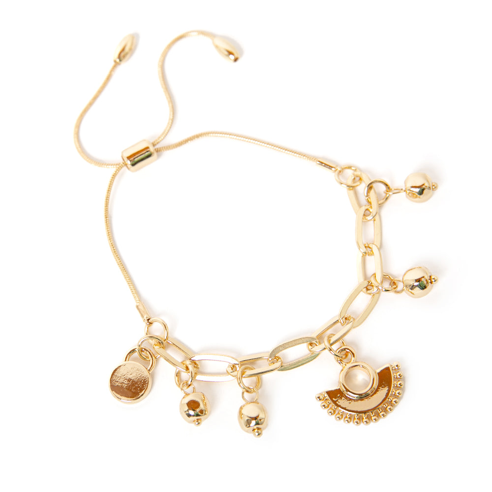 The Bay Bracelet in gold with beaded charms and a gorgeous fan charm around the length