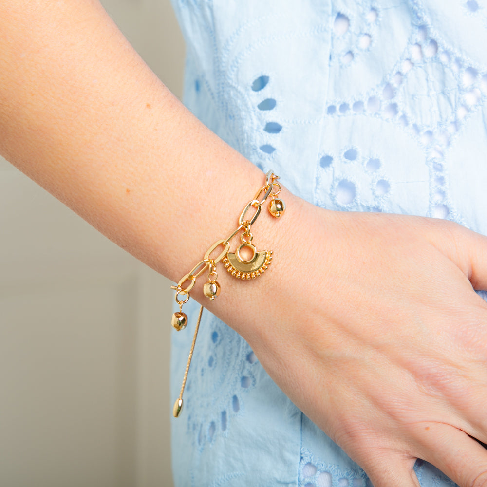 The Bay Bracelet in gold with an adjustable toggle so that you can wear it at your desired length