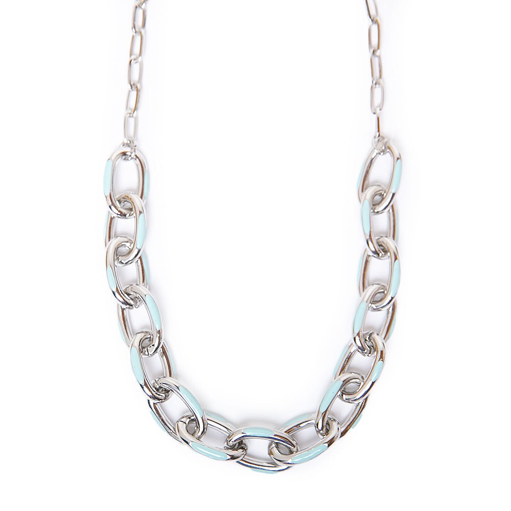 The Enya necklace in silver and turquoise blue with a chunky metal chain and a metal clasp fastening
