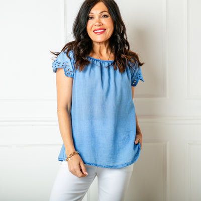 The denim blue Linen Blend Flutter Top which is made from a mix of cotton and linen and is perfect for summer