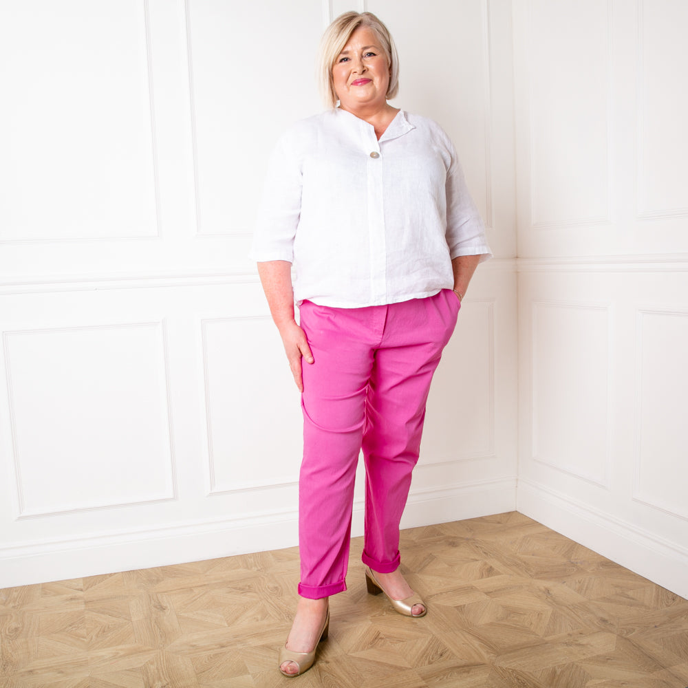 Plus size stretch trousers in fuchsia pink with an elasticated waistband with a drawstring tie detail