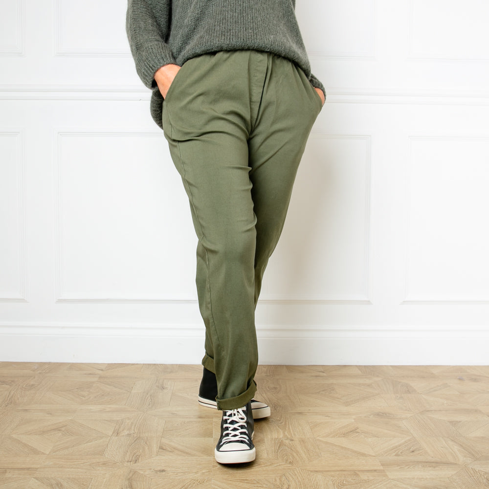 Plus size stretch trousers in khaki green with an elasticated waistband with a drawstring tie detail