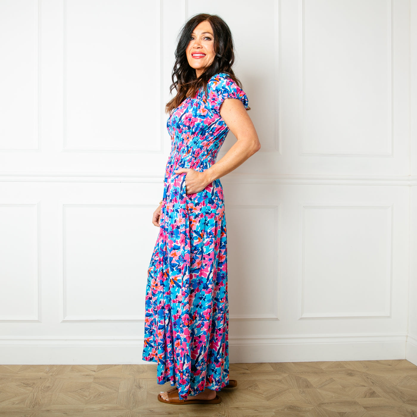 The floral blue Printed Button Maxi Dress with a shirred elasticted waistband and button detailing down the front