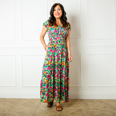 The floral green Printed Button Maxi Dress with a shirred elasticted waistband and button detailing down the front