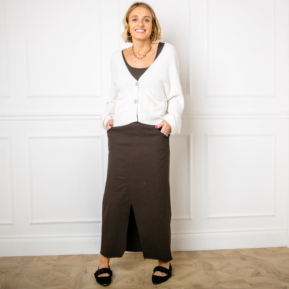 The chocolate brown Raw Hem Midi Skirt with an elasticated waist and drawstring detailing like our best selling stretch trousers