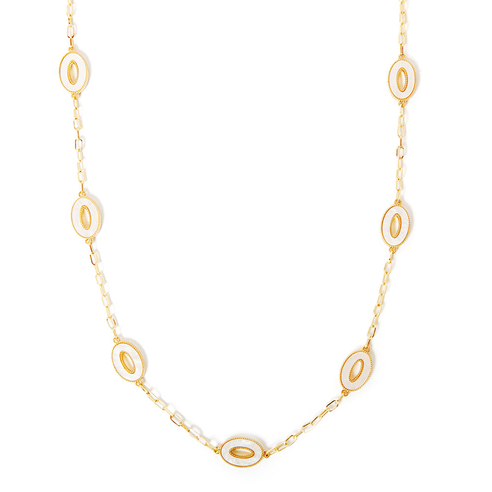 The Skye Necklace in gold with white iridescent oval pendants around the length of the chain