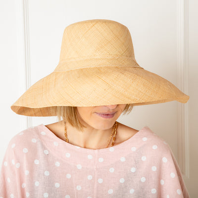 The Versailles Sun Hat in natural brown cream handmade in Madagascar from sustainable raffia
