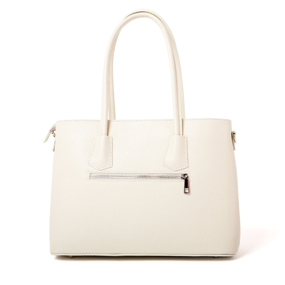 The back of the Cream Richmond Handbag with the outside zip pocket on the back 