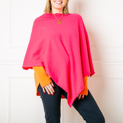 Tilley poncho in Flamingo Pink, super soft, high neck, waterfall shape, easy to wear, women's outerwear, women's ponchos, pink tones, statement pink tone