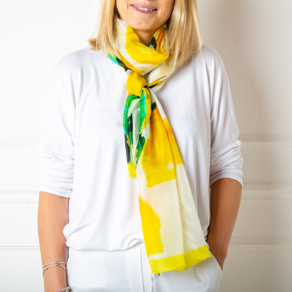 The lemon print 100% silk demi scarf in a slimmer width to our regular silk scarf collection 