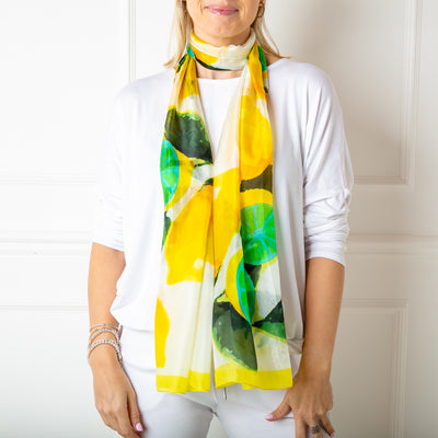 The lemon print scarf made from 100% luxury silk. It makes the perfect gift for someone special.