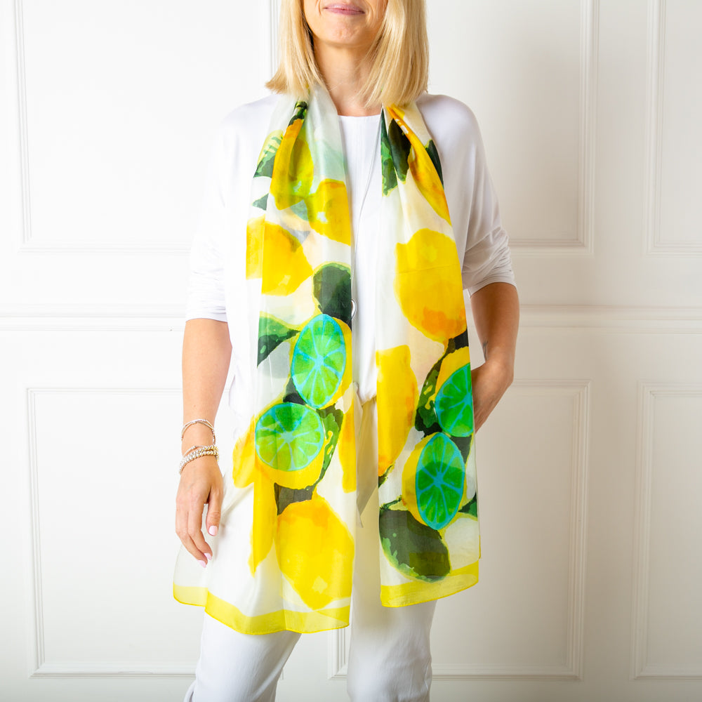 The lemon print 100% silk scarf which can be worn in many different ways
