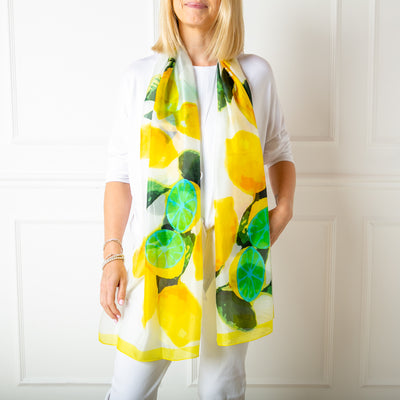 The lemon print 100% silk scarf which can be worn in many different ways