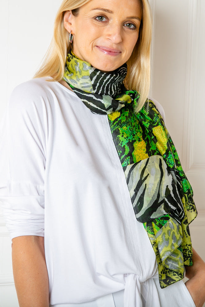The green animal print scarf made from 100% luxury silk. It makes the perfect gift for someone special.