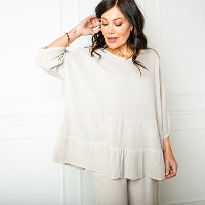 The stone cream Linen Blend Tiered Top made from a mix of cotton and linen for a lightweight relaxed summer look