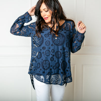 The Broderie Mesh Blouse in navy blue with buttons down the front to the bust and a vest top underneath