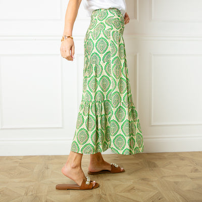 Flora Stamp Tiered Skirt in green with a wide shirred elasticated waistband 