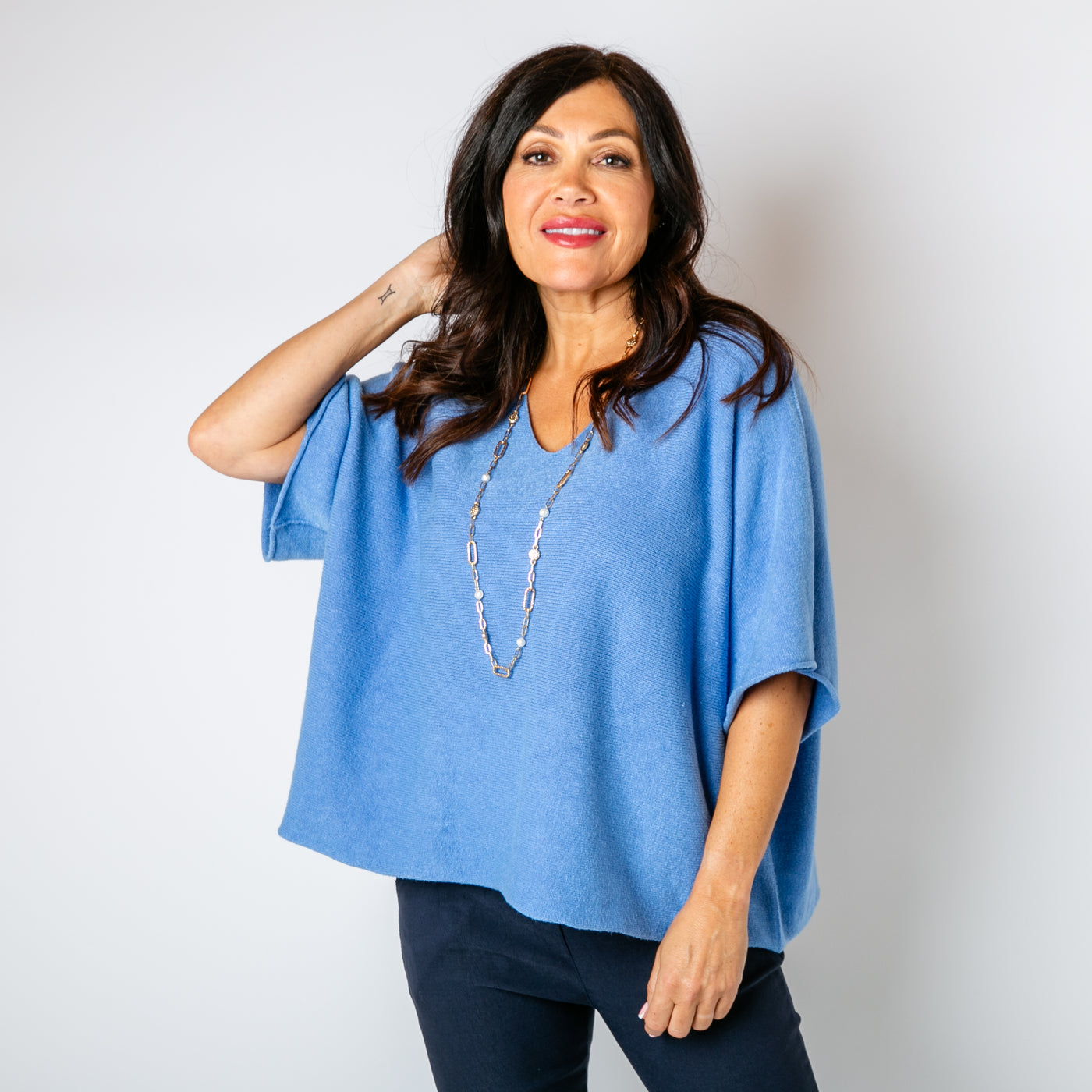 The cornflower blue 3/4 Sleeve Batwing Jumper which is great for layering