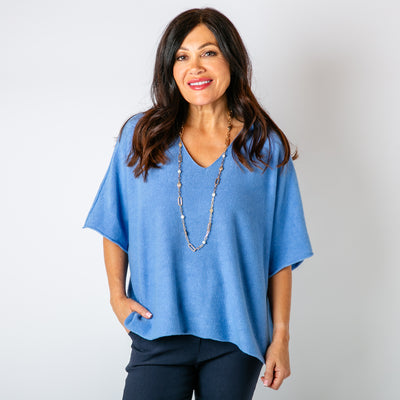 The cornflower blue 3/4 Sleeve Batwing Jumper with sleeves that end at the elbow