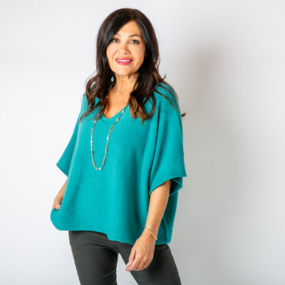 The teal blue 3/4 Sleeve Batwing Jumper with sleeves that end at the elbow