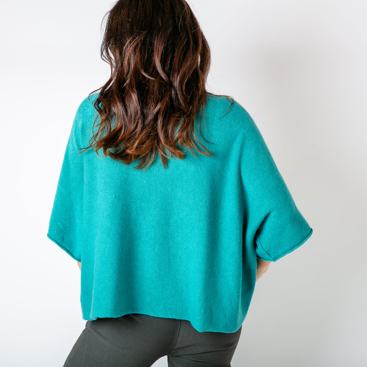 The teal blue 3/4 Sleeve Batwing Jumper which is great for layering