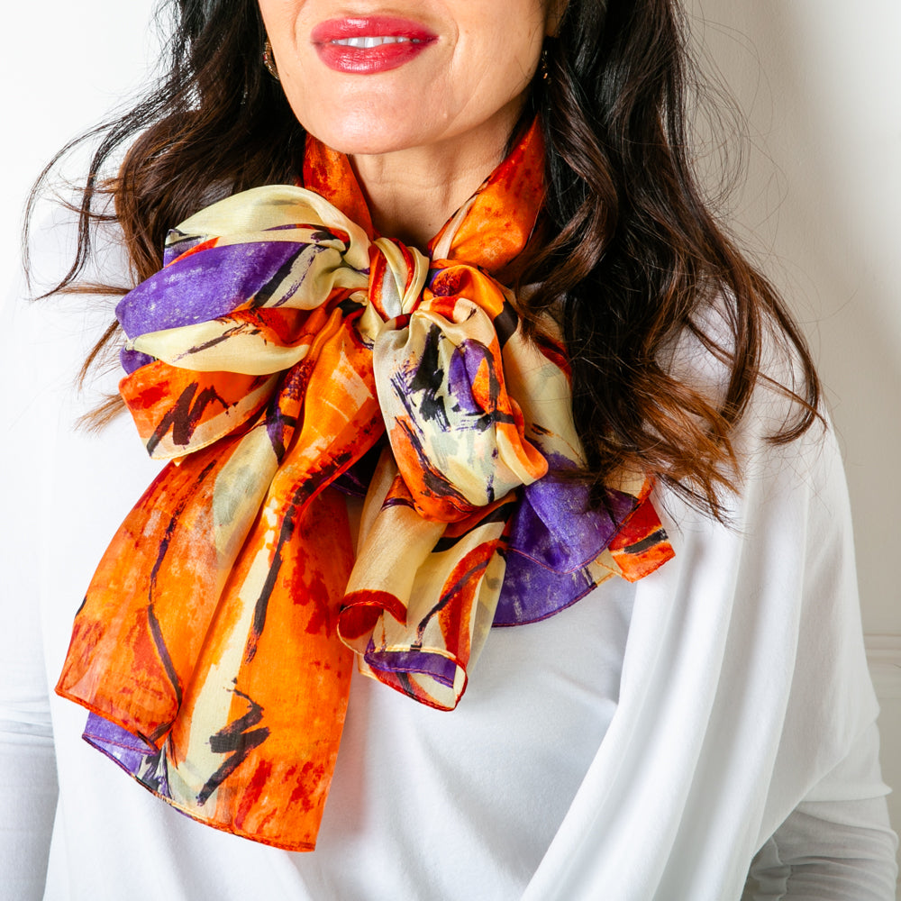 The Orange Circles Silk Scarf which makes the perfect summer accessory for your wardrobe