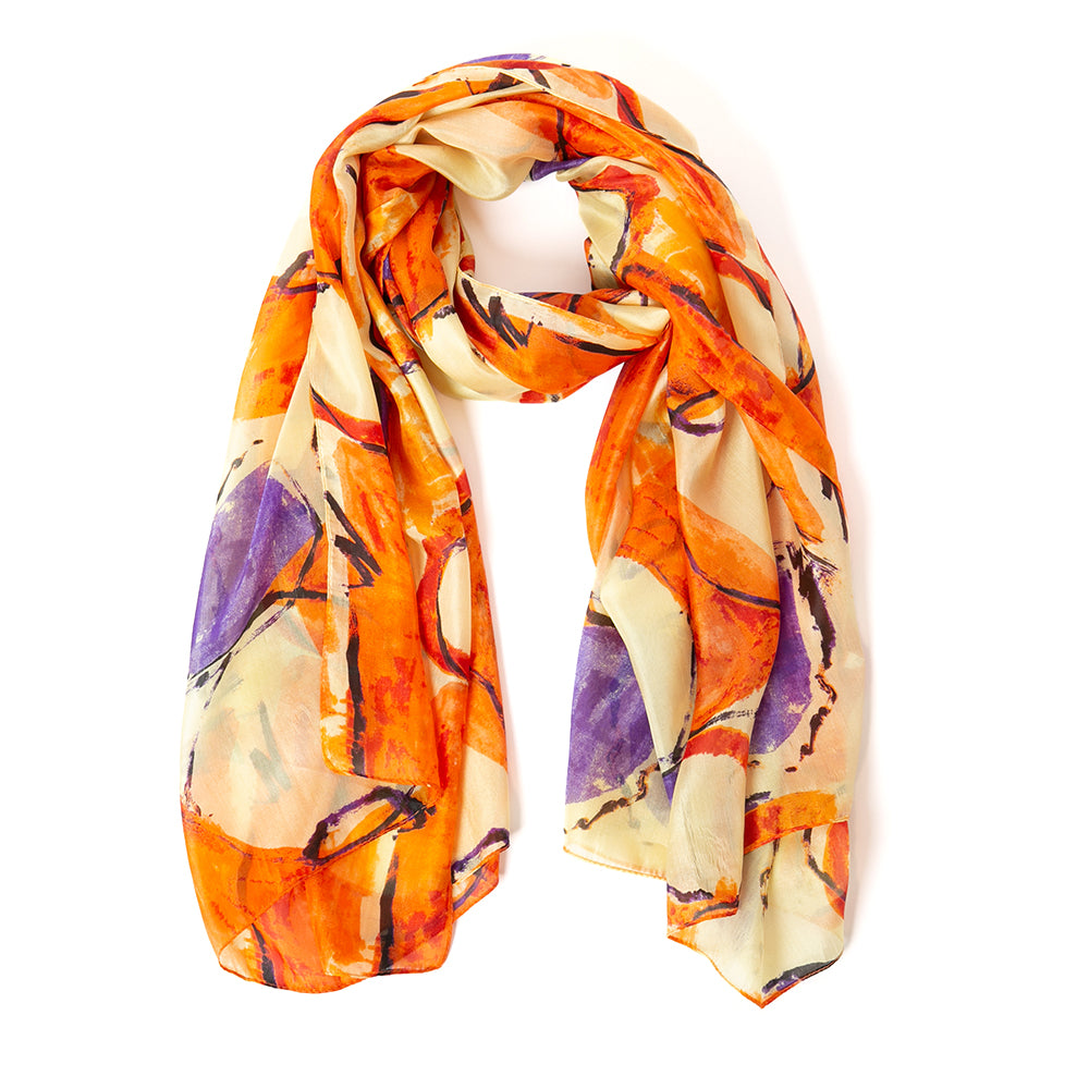 The Orange Circles Silk Scarf with accents of brown, purple and cream
