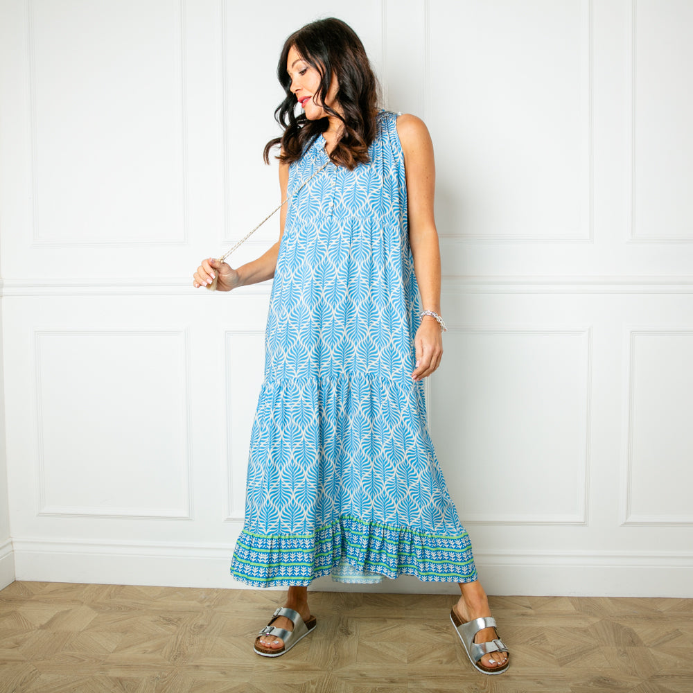 The blue All Over Print Maxi Dress featuring a vibrant leaf style print perfect for summer