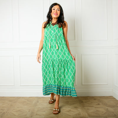 The green All Over Print Maxi Dress with a v neckline and a tassel tie detail around the neck