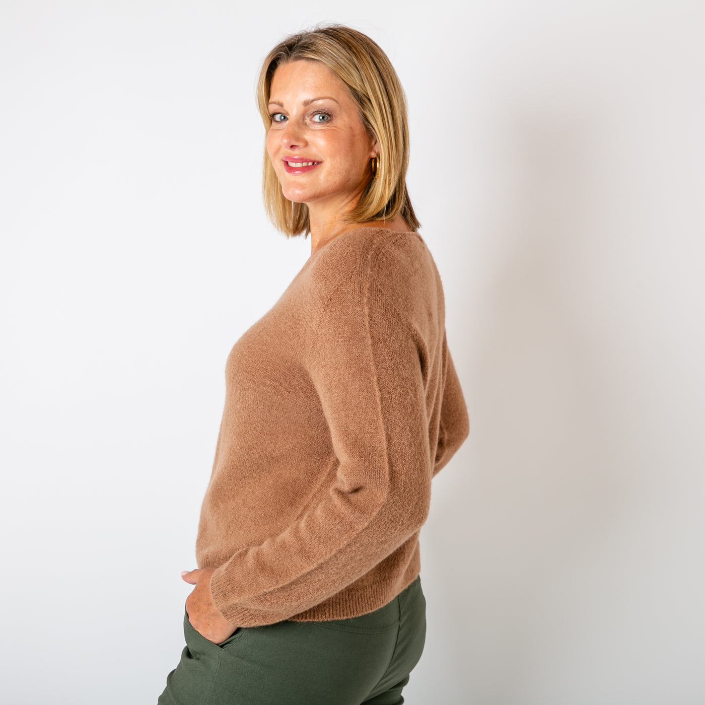 The toffee brown Alpaca Blend V Jumper in a cropped length with a seam detail on either arm