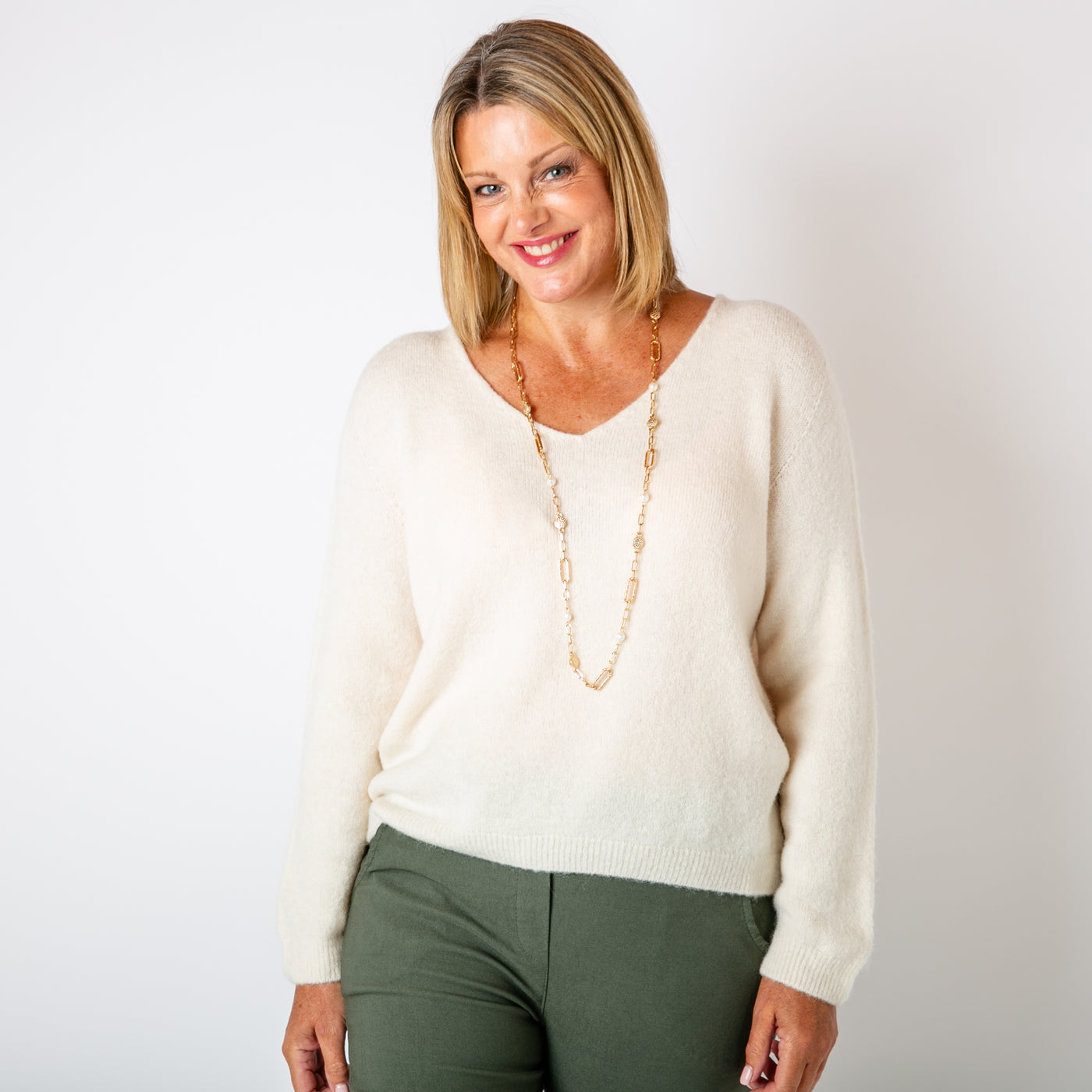 The cream Alpaca Blend V Jumper with long sleeves and a V neckline