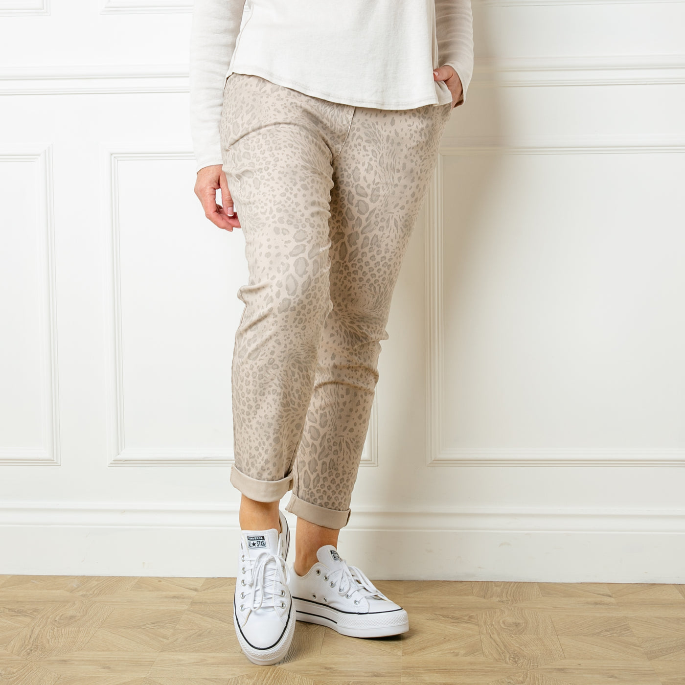 The stone beige cream brown Animal Print Stretch Trousers with a drawstring elasticated waistband and pockets on either side
