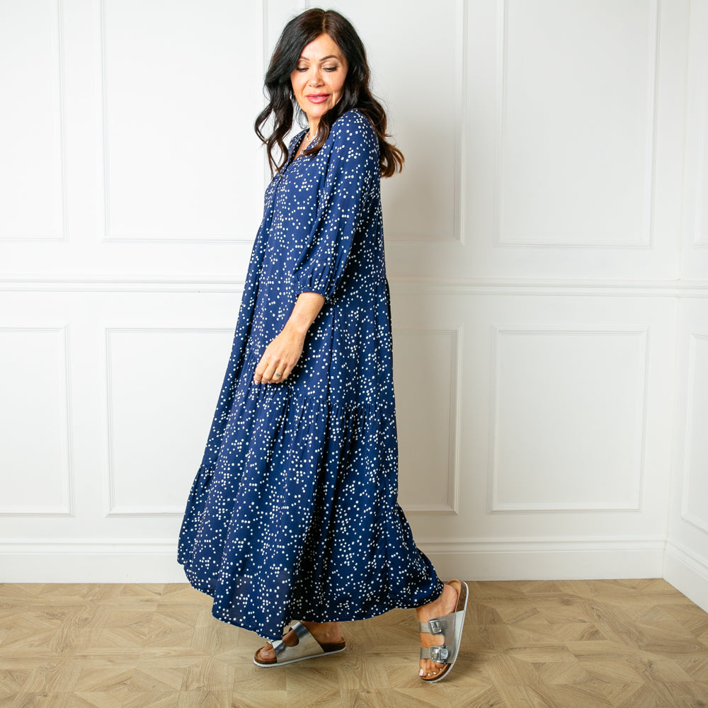 The navy blue Asymmetric 3/4 Sleeve Tea Dress in a maxi length with an alternating tiered structure down the skirt