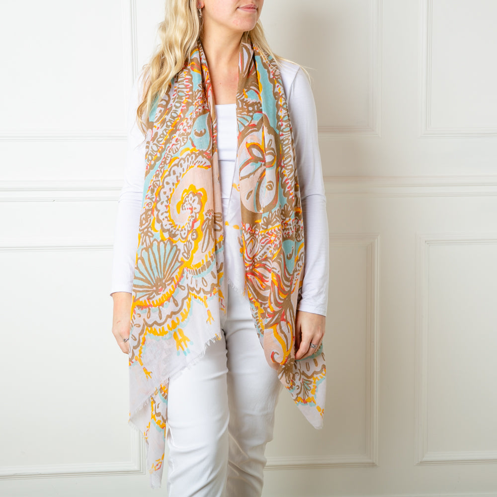 The Brown Taupe Bali Scarf featuring a beautiful intricate paisley pattern print including floral designs