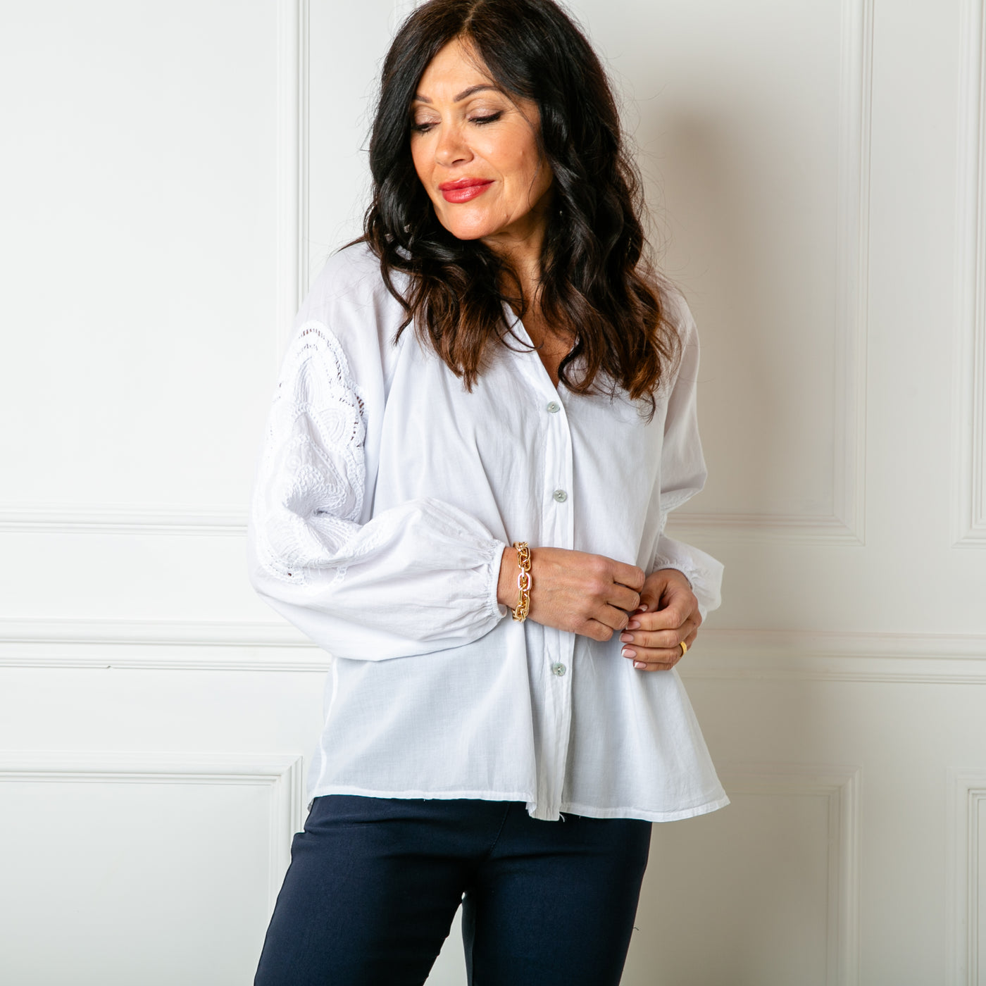 The Balloon Sleeve Shirt in white with long sleeves featuring beautiful broderie embroidery detailing