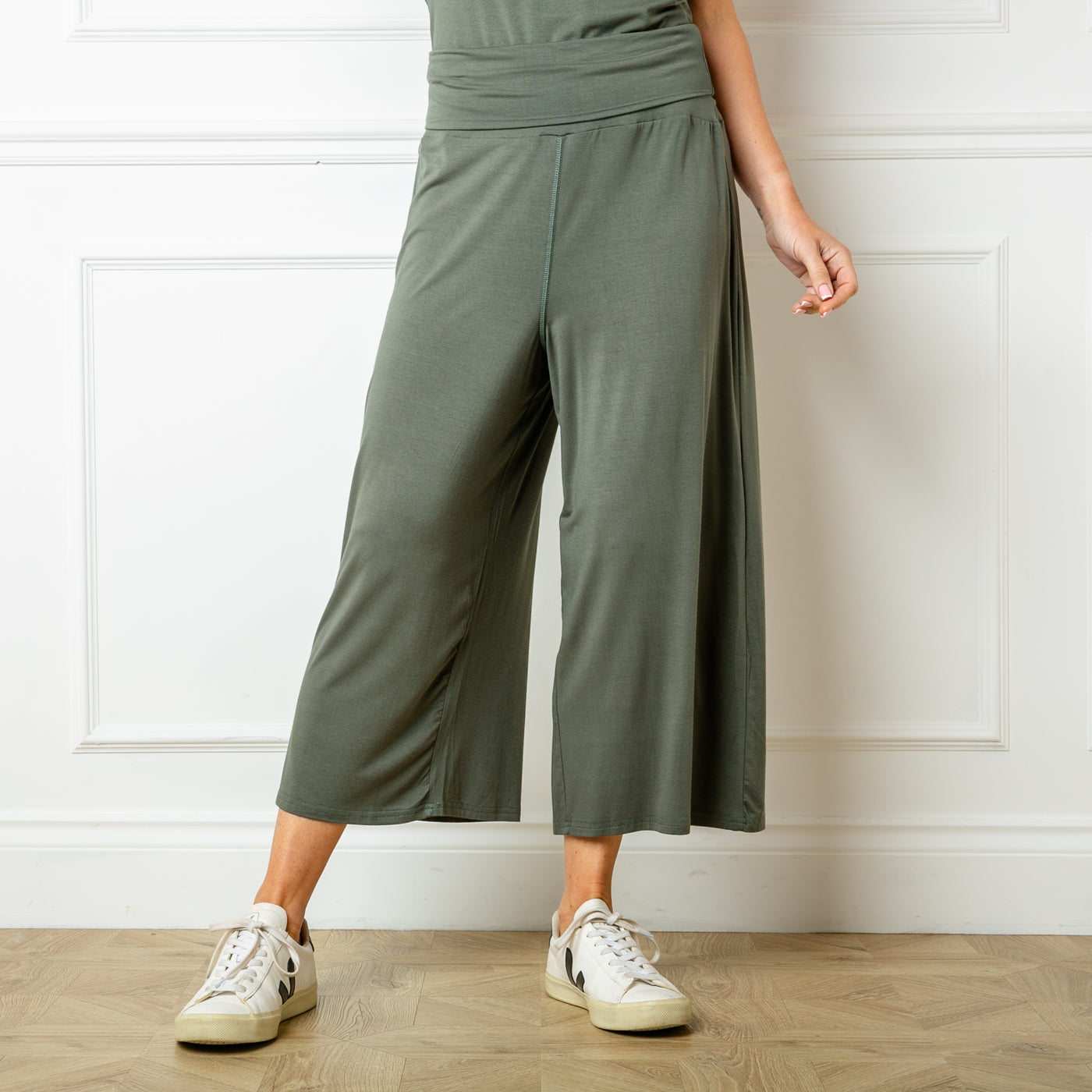 The khaki green Bamboo Fold Over Pants with a wide leg silhouette in a soft and stretchy material