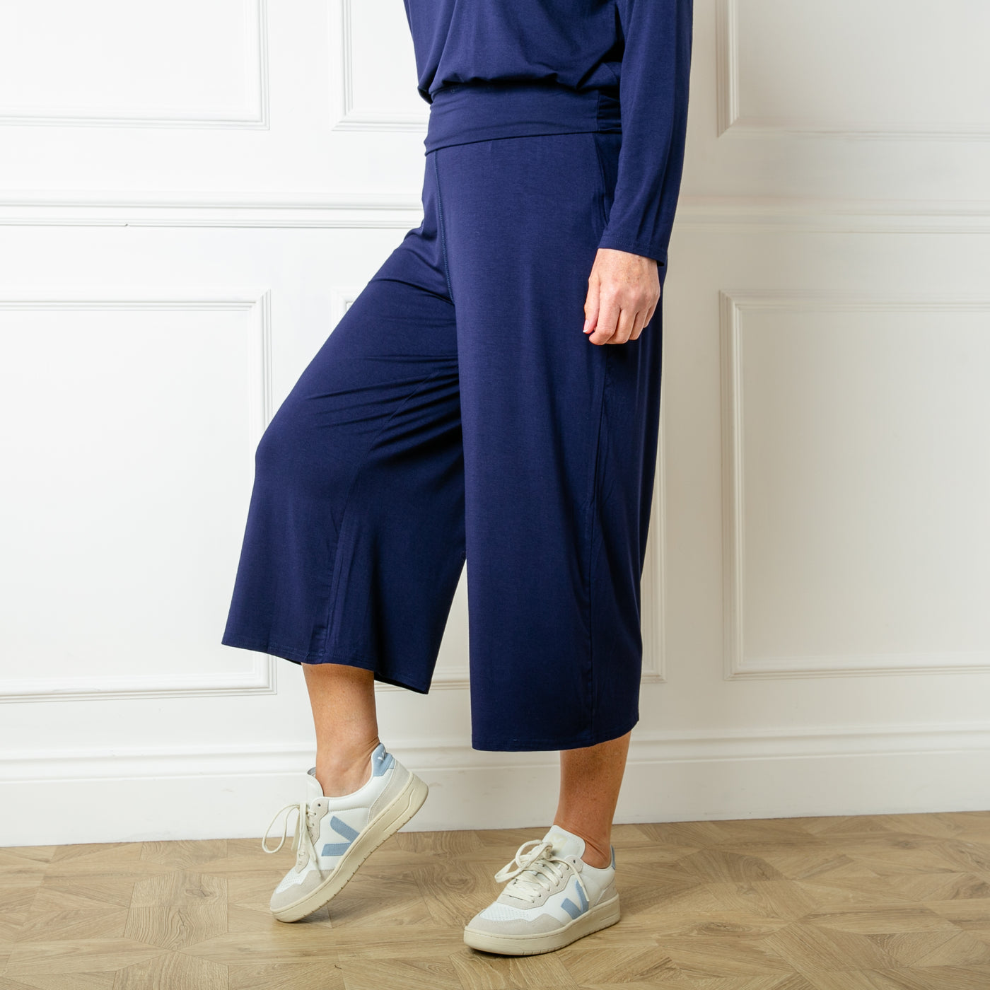 The navy blue Bamboo Fold Over Pants with a stretchy elasticated waistband which can be rolled or folded for desired fit and comfort