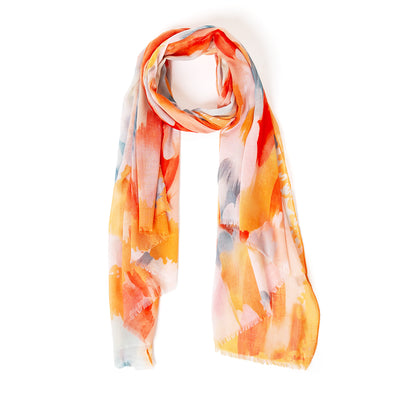 The orange Barcelona Scarf featuring a beautiful watercolour brush effect pattern