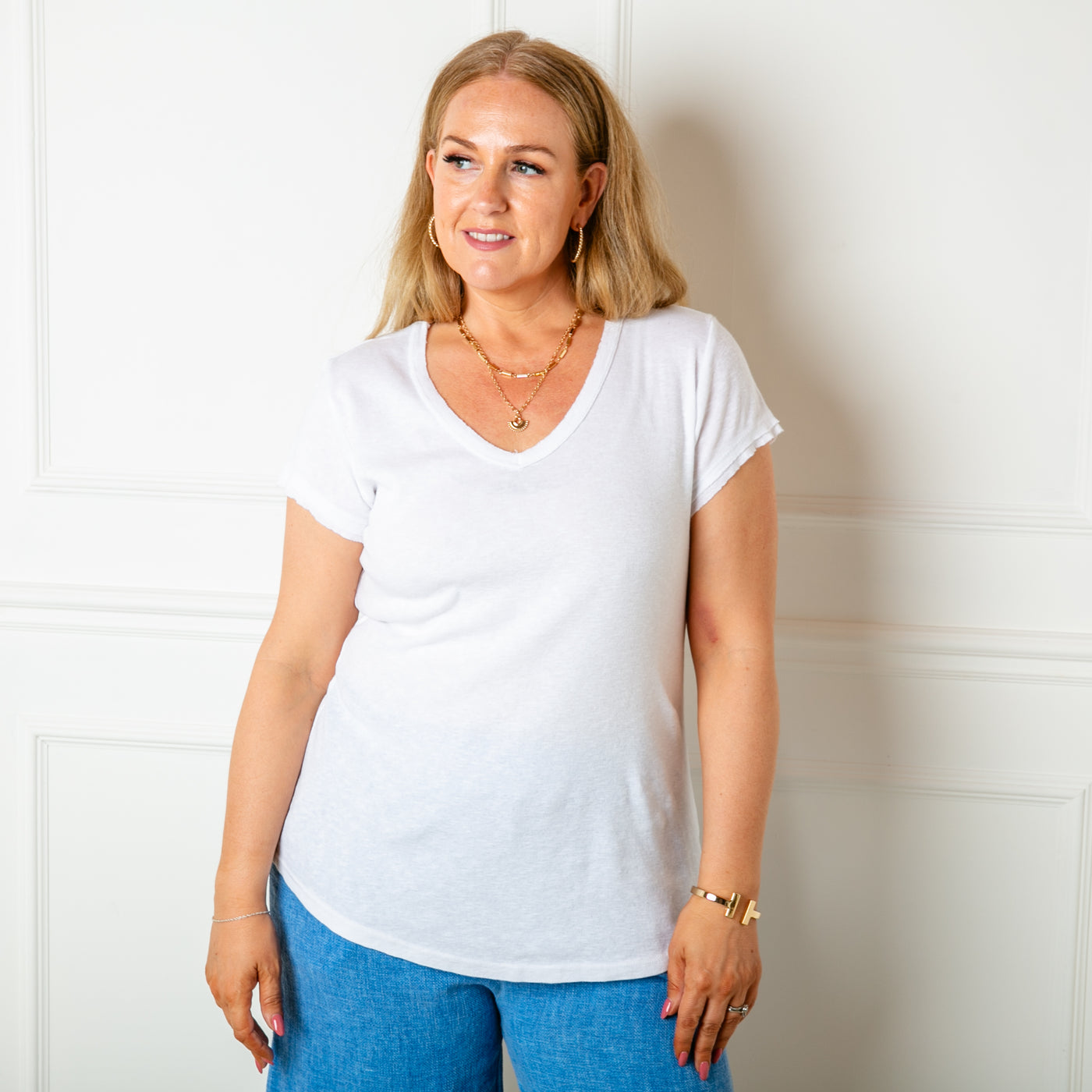 The white Basics V Neck Top made from a lightweight stretchy cotton material