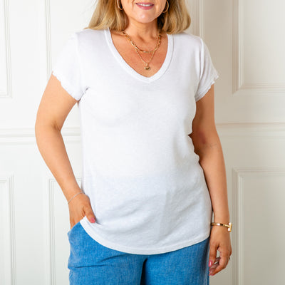 The white Basics V Neck Top with short sleeves perfect for summer