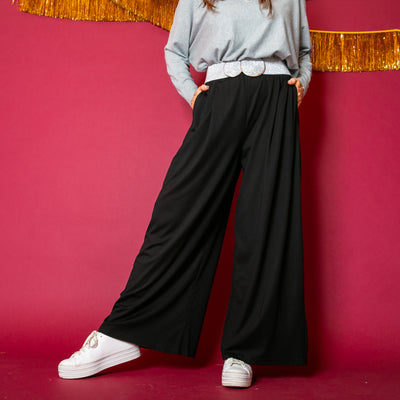 The Basics Wide Leg Trousers in black with an elasticated waistband for added comfort