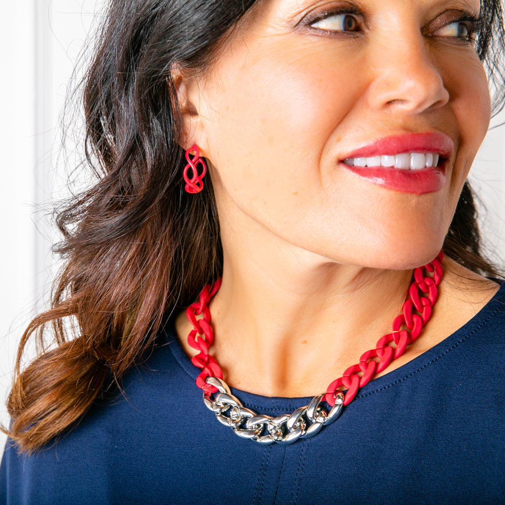 The Billie Earrings in fuchsia pink red which pairs perfectly with the Camilo Necklace 