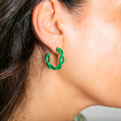 The Billie Earrings in emerald green, perfect for adding a pop of colour to any outfit