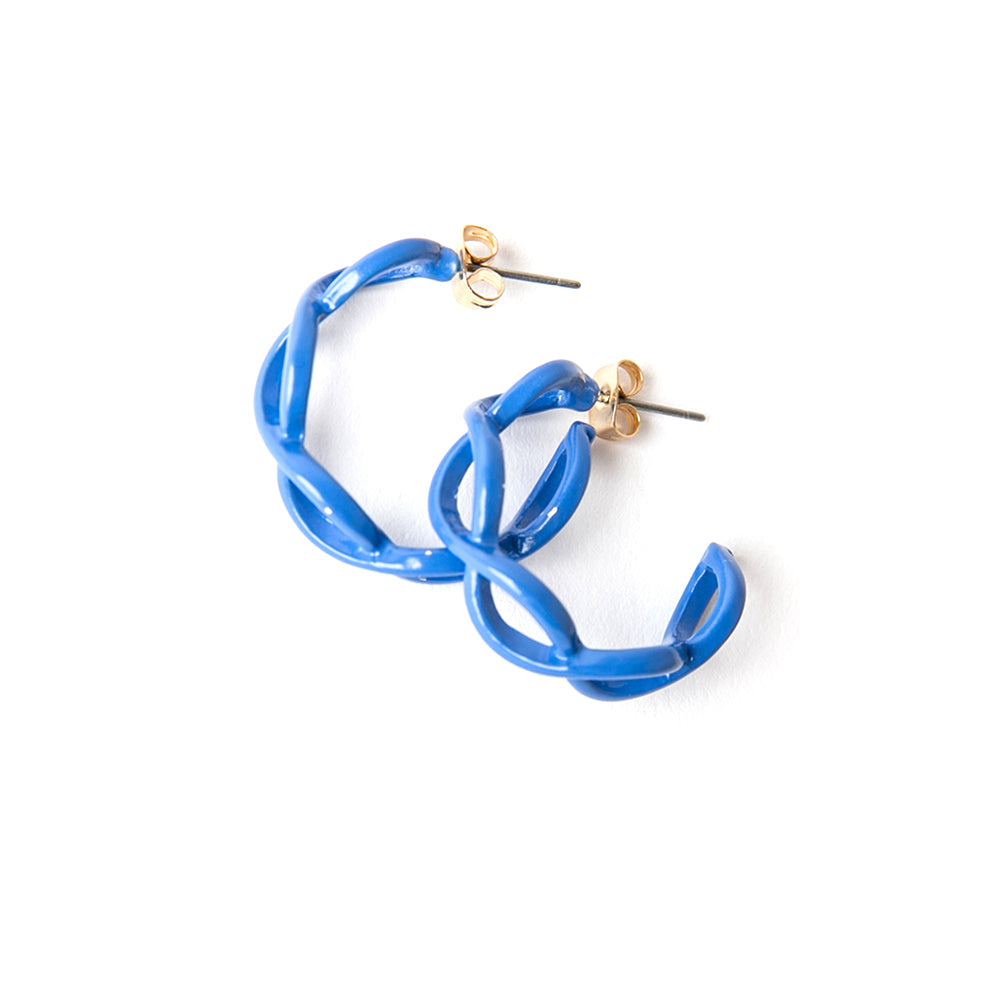 The Billie Earrings in royal blue with a twisted intertwined hoop design 