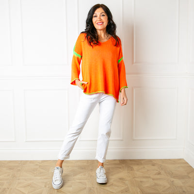 The orange Block Stitch Jumper made from a fine knitted blend of acrylic and cotton, perfect for summer