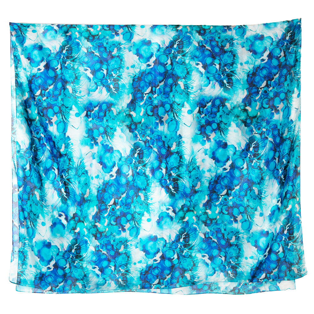 The Blue Ink Dot Silk Scarf which makes the perfect finishing touch for any outfit