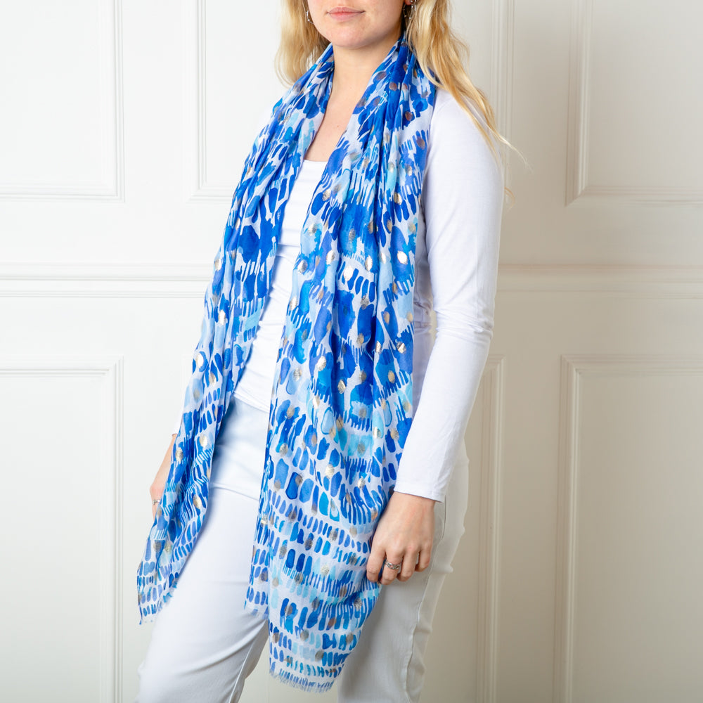 The blue Bora Scarf made from 100% viscose, super soft and lightweight, perfect for spring and summer