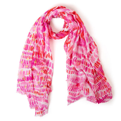 The Bora Scarf in pink which can be worn in many ways including as a sarong on the beach