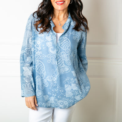 The dusky blue Botanical Cotton Blouse in a beautiful floral paisley print with white accents